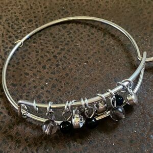 Silver Tone Charm Bangle with 3 Black, 3 Smoky, 3 crystal like  Bead charms